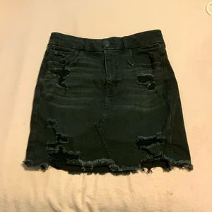 Black skirt with small rips